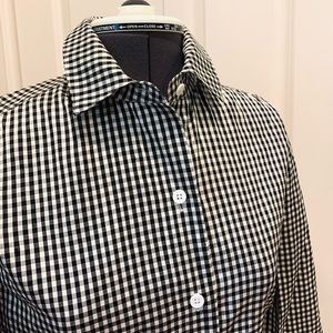 100% silk button up blouse.